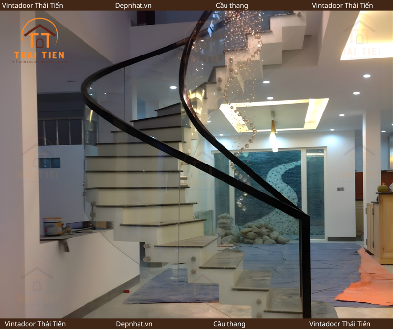 Cầu thang kính tay vịn inox